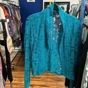 Size small teal lace, semi transparent jacket